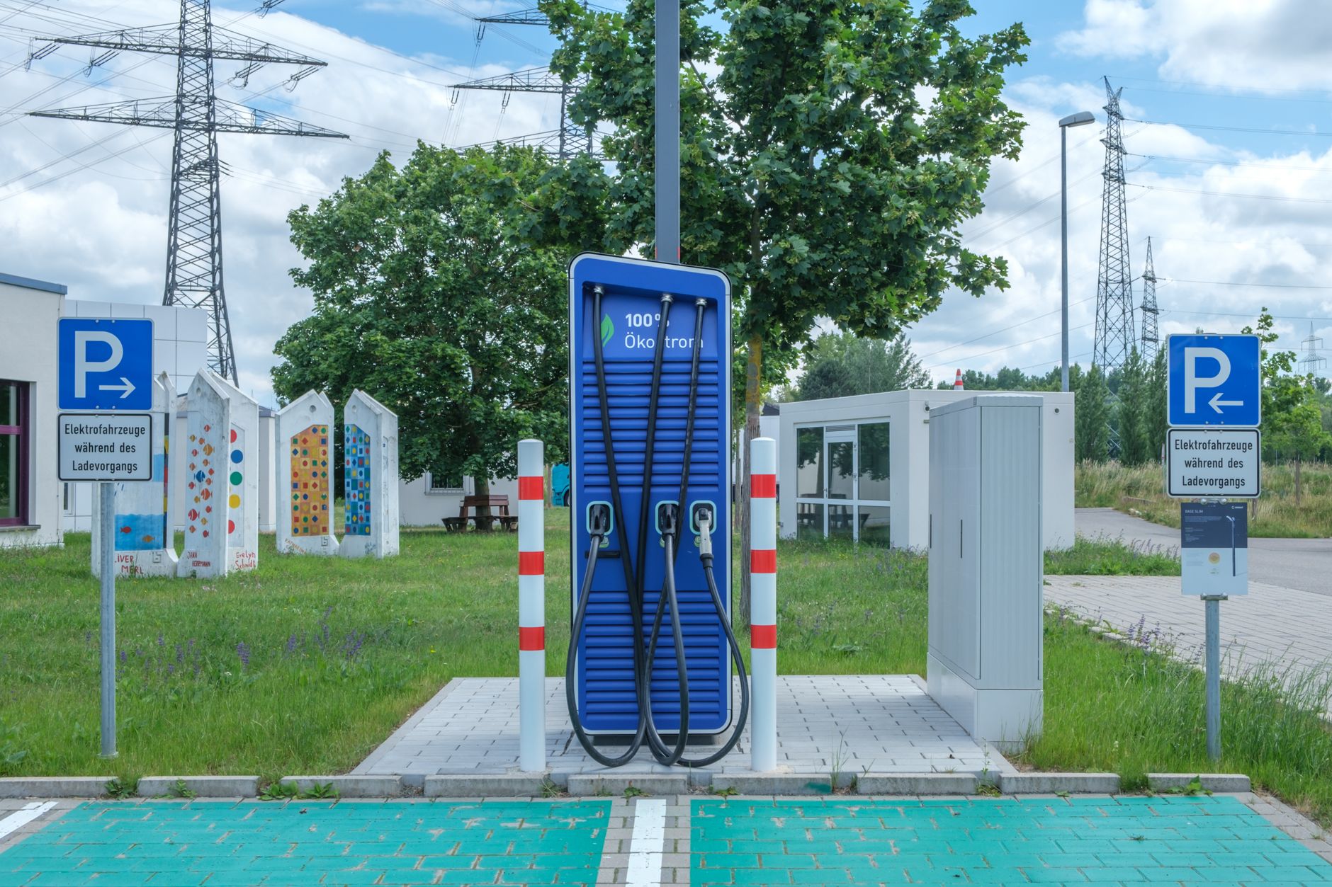 An EV charging on a highway, where range assumptions meet reality