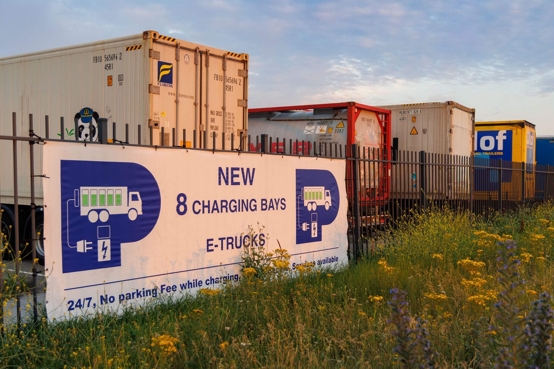 Electric trucks at a charging depot