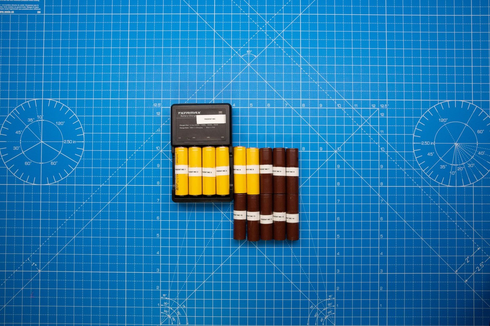 Rows of cylindrical and prismatic lithium battery cells on a production line