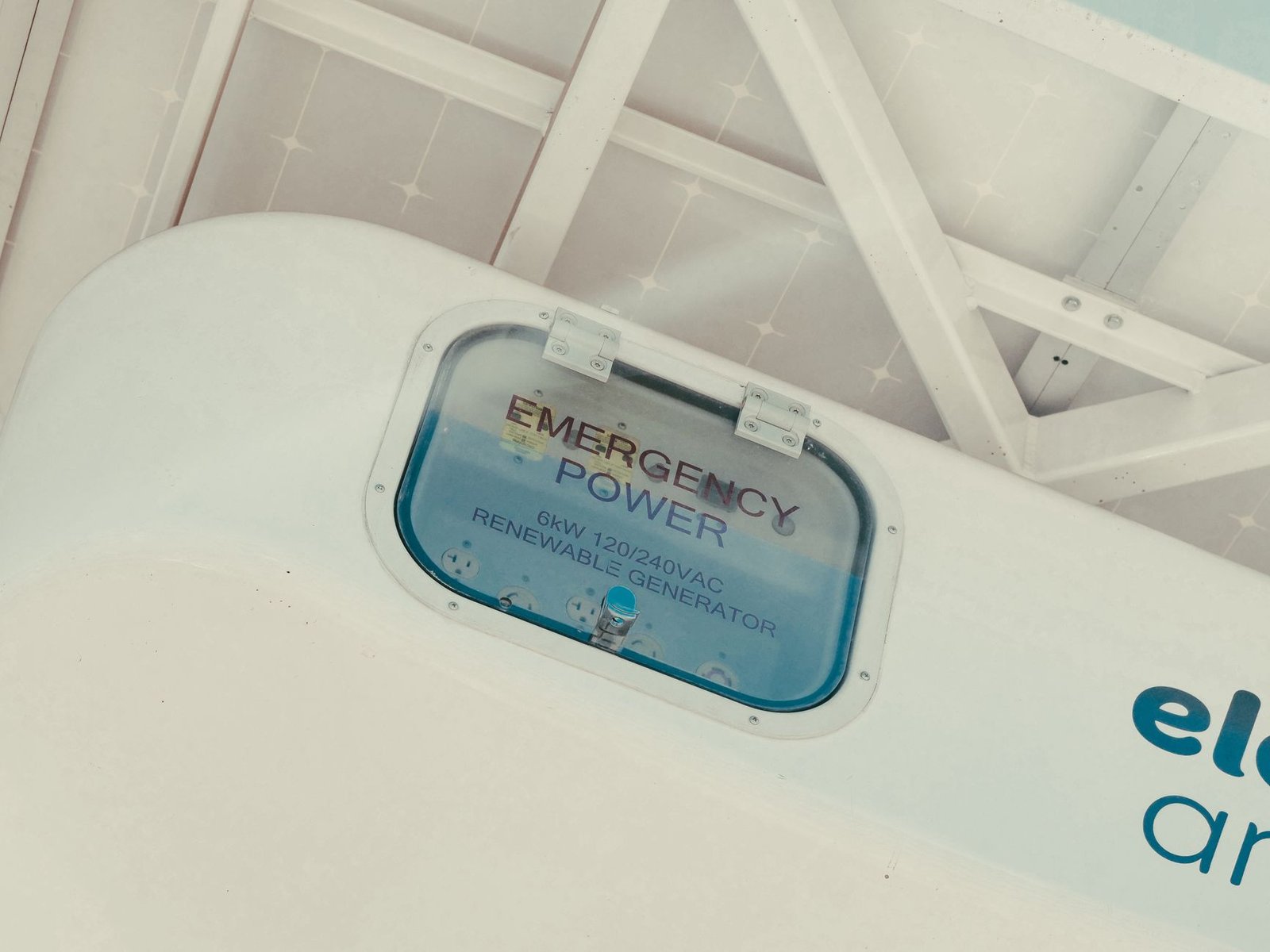 A grid-scale lithium-ion battery storage installation under a wide sky
