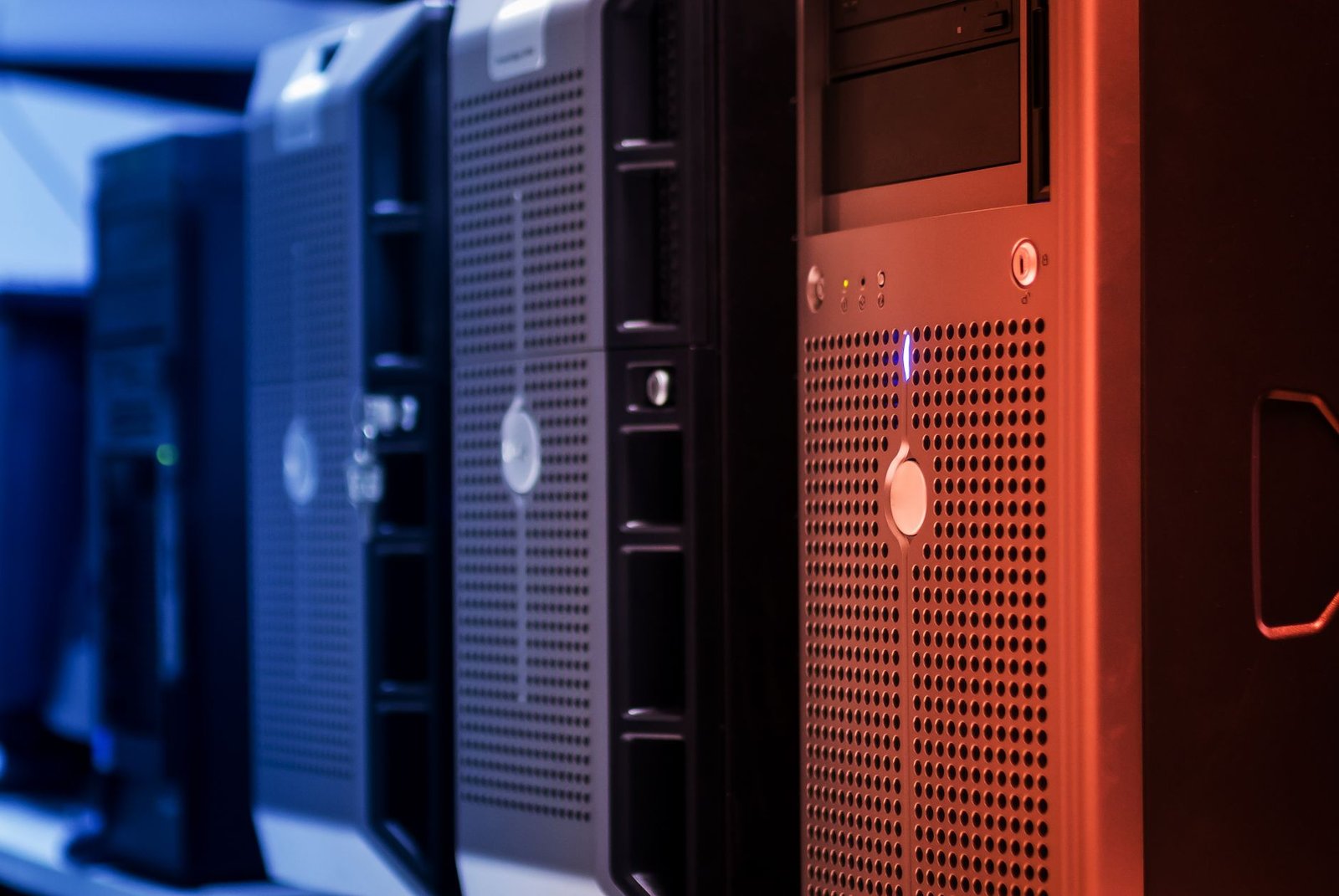 Server racks filling a data centre hall, the kind of flat, round-the-clock load that runs at a high load factor