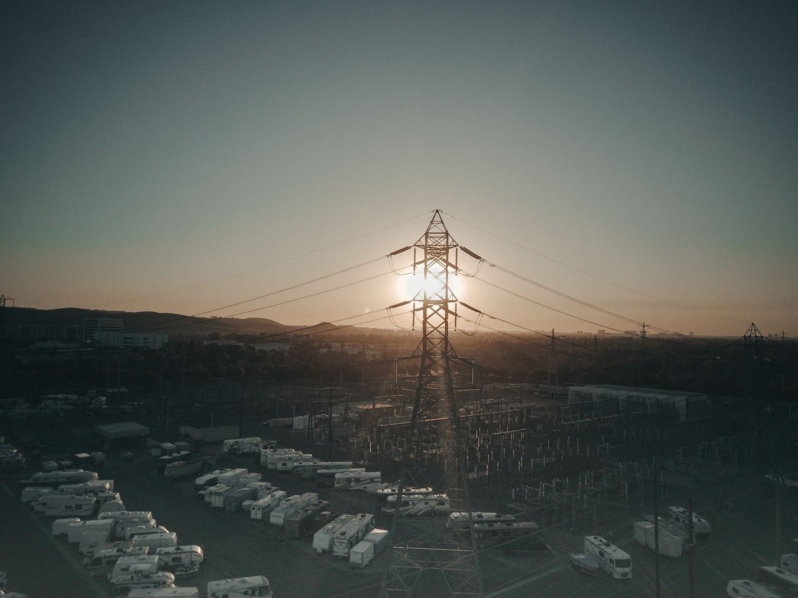 Grid-scale lithium-ion battery storage containers at a utility substation